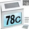 A solar-powered house number sign with the number 78c displayed. Podgląd zdjęcia produktu