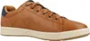 A side view of a brown leather sneaker with a white sole. Anteprima dell’immagine prodotto