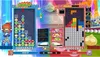 A split-screen view of two players competing in a puzzle game, likely Puyo Puyo Tetris 2, showing gameplay elements and character art. Produktbild-Vorschau