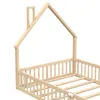 A wooden bed frame with a house-like structure and a slatted base, shown from a low angle. Náhled obrázku produktu