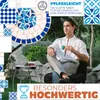 A man is sitting in a garden, holding a cup of coffee, with a mosaic table and cake in the foreground. Produktbild-Vorschau