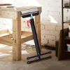 A workshop setting with a workbench and a roller stand. Produktbild-Vorschau