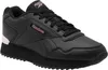 A studio shot of a black Reebok sneaker with pink accents. Voir les images du produit