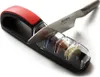 A knife sharpener with a knife being sharpened. Náhled obrázku produktu
