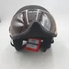A ski helmet with a visor is shown against a white background. Anteprima dell’immagine prodotto