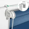 A close-up view of a blue roller blind mechanism attached to a window frame, with a detailed inset showing the clamp fitting. Produktbild-Vorschau