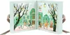 An open advent calendar with a winter street scene illustration. Produktbild-Vorschau
