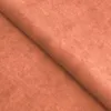 A close-up view of orange fabric, folded to show texture and depth. Podgląd zdjęcia produktu