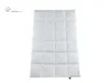 A white down comforter is laid flat on a white background, showing its quilted pattern. Produktbild-Vorschau
