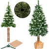 A Christmas tree with a natural trunk, showing its assembly components and a finished tree. Produktbild-Vorschau