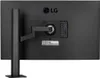 The back of a black LG monitor with its stand and ports visible. Produktbild-Vorschau