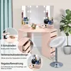 A pink corner vanity desk with a lighted mirror, makeup, and a stool, with informational callouts. Voir les images du produit