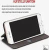 A smartphone in a flip case is shown standing up, demonstrating its stand function. Text describes the feature. Produktbild-Vorschau