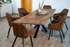 A dining table with chairs in a room setting. Produktbild-Vorschau