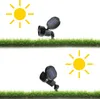 Two solar-powered spotlights are shown on grass, with sun icons indicating their function. Produktbild-Vorschau