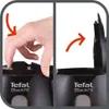A split image showing a hand interacting with a black kettle lid. Anteprima dell’immagine prodotto