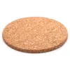 A round cork coaster is shown on a white background. Náhľad obrázku produktu
