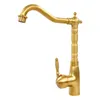 A vintage-style gold faucet on a white background. Podgląd zdjęcia produktu