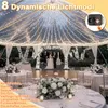 A wedding reception tent decorated with string lights, with a couple standing at an altar. Anteprima dell’immagine prodotto