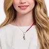 Close-up of a young person wearing a necklace. Produktbild-Vorschau
