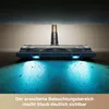 A vacuum cleaner head with blue lights illuminating dust on a floor, shown from a low angle. Voir les images du produit