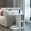 A white side table with shelves is placed next to a light-colored sofa in a living room setting. Anteprima dell’immagine prodotto