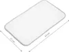 A white changing mat with gray trim, shown with dimensions indicated by arrows and text. Produktbild-Vorschau