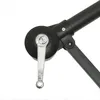 Close-up of a crank mechanism on a dark umbrella pole. Anteprima dell’immagine prodotto