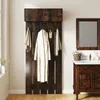 A bathroom scene with a wall-mounted coat rack and vanity. Náhled obrázku produktu
