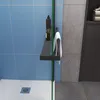 A close-up view of a shower enclosure with a shelf and towel holder. Produktbild-Vorschau