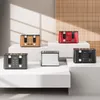 Multiple toasters are displayed on white platforms against a light gray and wood-paneled background. Produktbild-Vorschau