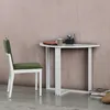 A white desk and a green chair are shown against a textured pink wall. Anteprima dell’immagine prodotto