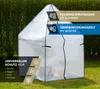 A white greenhouse tent is set up on a green lawn with a hedge in the background. Produktbild-Vorschau