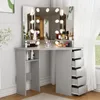 A vanity table with a tri-fold mirror and LED lights, set up in a room with curtains and a window. Voir les images du produit