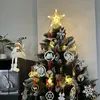 A decorated Christmas tree with a star topper and various ornaments. Náhľad obrázku produktu