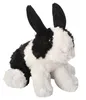 A plush toy rabbit with black and white patches sits on a white background. Náhled obrázku produktu