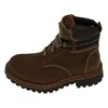 A brown leather boot on a white background. Anteprima dell’immagine prodotto