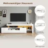 A white TV stand with integrated LED lighting is shown in a living room setting, with a TV mounted on the wall above it. Inset circles highlight different storage configurations. Anteprima dell’immagine prodotto