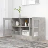 A sideboard cabinet with glass doors and shelves, filled with various items, placed in a room with a window and a rug. Produktbild-Vorschau