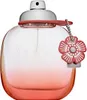A perfume bottle with a floral charm. Podgląd zdjęcia produktu