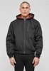 A man wearing a black hooded jacket. Produktbild-Vorschau