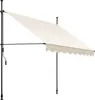 A cream-colored retractable awning with a scalloped edge, supported by black poles and a crank mechanism, shown against a white background. Náhled obrázku produktu