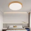 A modern bedroom with a ceiling light above a bed. Produktbild-Vorschau