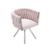 A pink velvet chair with silver metal legs on a white background. Produktbild-Vorschau