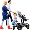A family walking with a stroller and a buggy board attachment. Produktbild-Vorschau