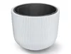 A white planter with a black insert is shown against a white background. Voir les images du produit