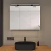 A modern bathroom vanity with a medicine cabinet, sink, and faucet. Produktbild-Vorschau