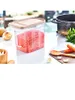 A clear, well-lit product shot of a food storage container filled with red lentils, placed on a white surface with some kitchen ingredients and a pot in the background. Anteprima dell’immagine prodotto