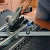 A person is using a Dremel cordless circular saw on a cutting table. Produktbild-Vorschau