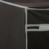 A close-up view of the corner of a black fabric storage cube with gray trim and a zipper. Náhled obrázku produktu